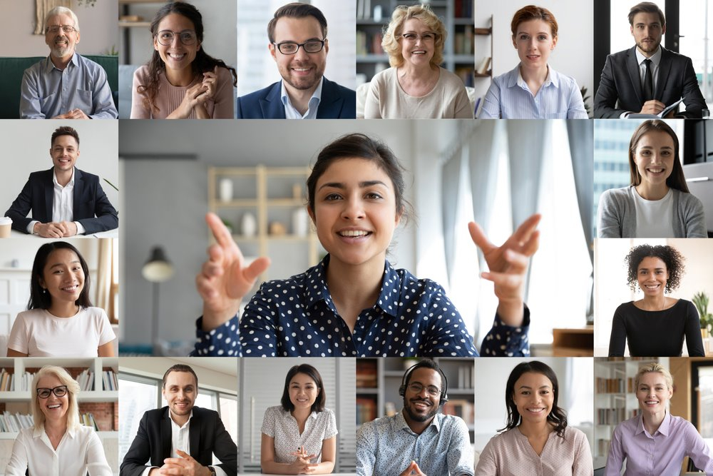 Secrets to Advancing Your Career in a Remote Job: Picture of remote workers having video conferencing meeting.