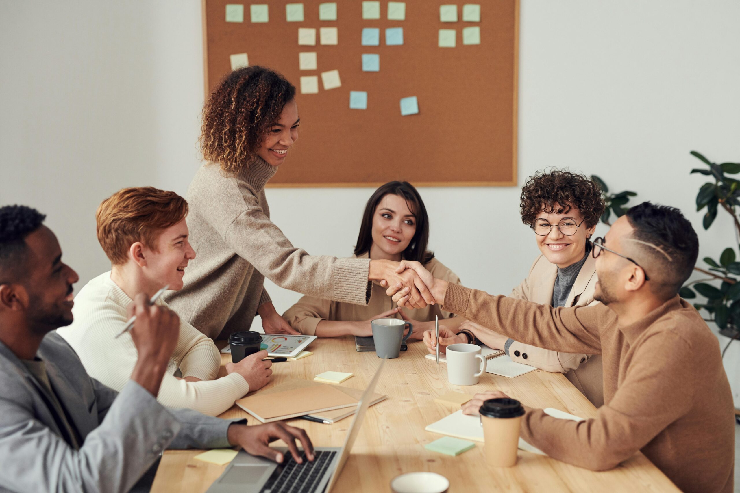 Remote Jobs vs. Office Jobs: Which is Better for Your Career: Group of creative businesspeople working together on a project