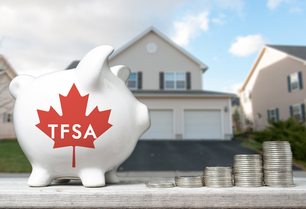 Tax-Free Savings Accounts (TFSAs) For Newcomers in Canada: Canadian Tax-Free Savings Account concept with a piggy bank and coins stacks